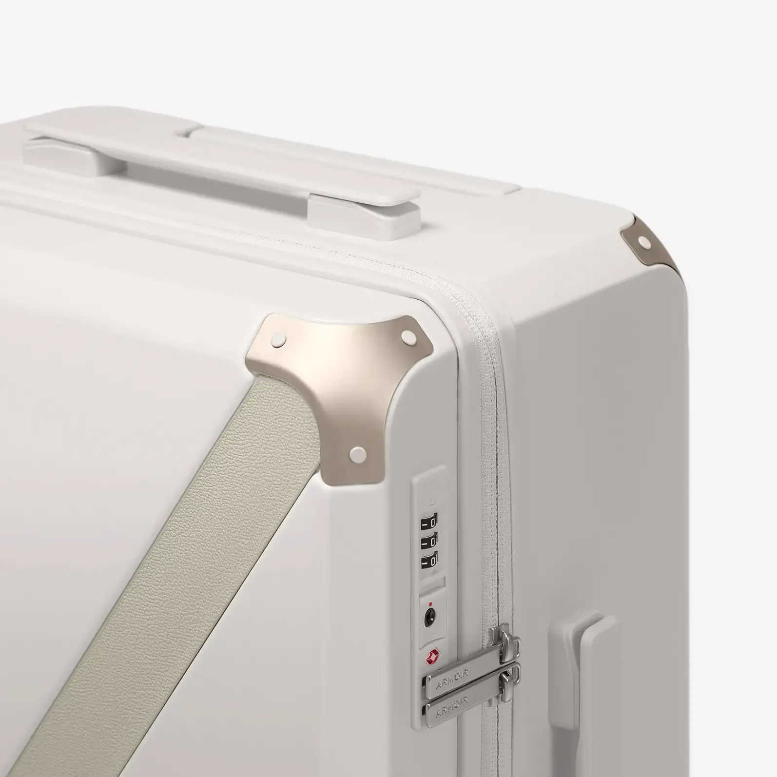 Beige hard shell luggage, The Cabin Trunk Essential by Armoir, corner detail